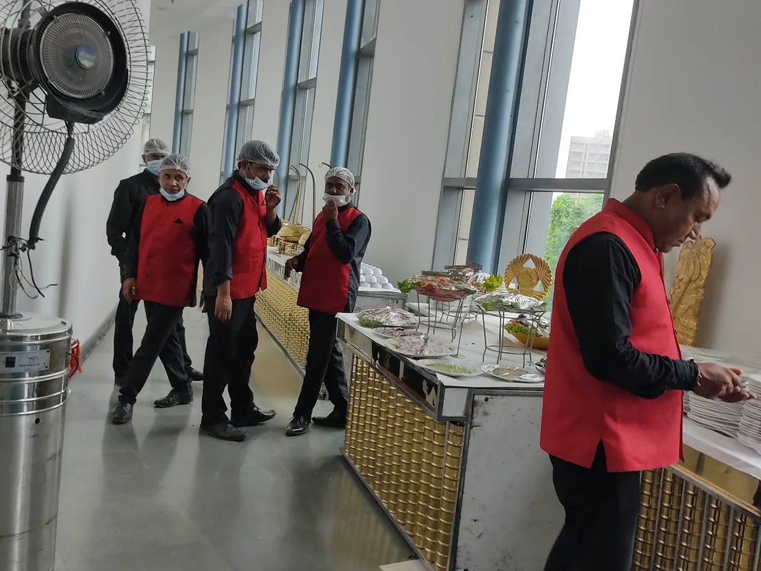 Catering team working beside a buffet counter